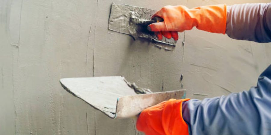 Hand image worker Concrete plaster Hand image worker Concrete plaster
